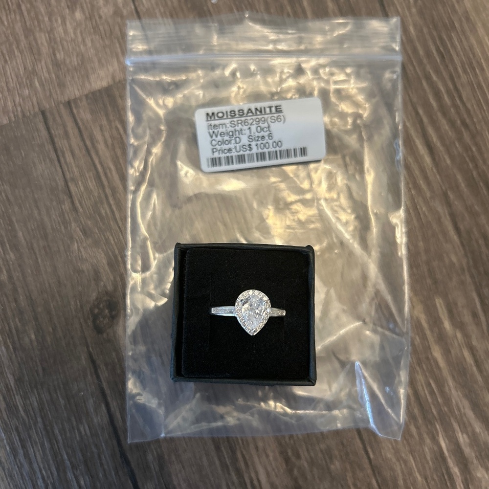 Moissanite teardrop 1 carat size 6 ring Sterling silver band